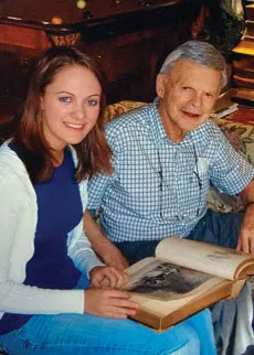 Jim sharing time with his granddaughter, Emile Bouvier